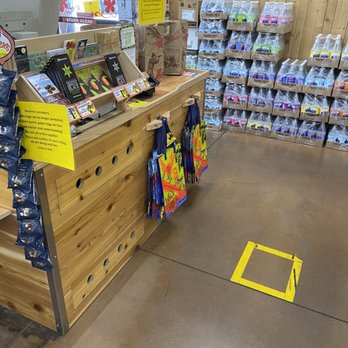 Trader Joe's - The square mark on the ground shows where to stand while waiting for the cashier to ring you up and bag all your groceries. - Grocery Near Me - Los Altos, California Trader Joe's - The square mark on the ground shows where to stand while waiting for the cashier to ring you up and bag all your groceries. - Grocery Near Me - Los Altos, California
