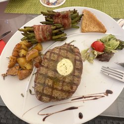 Angus Steakhouse - Would suggest the green beans, rosemary potatoes & steak. Mmmmmm