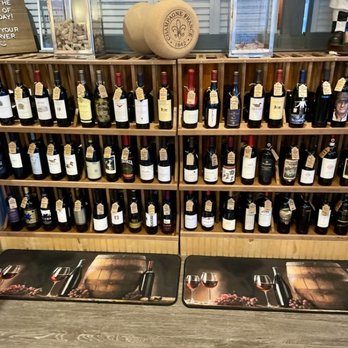 At Elm St Grill - Entryway with a great line up of wines - New American Near Me - Greensboro, North Carolina