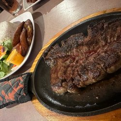 La Antioquena Restaurant - Skirt steak (entraña) with rice, salad and maduros
