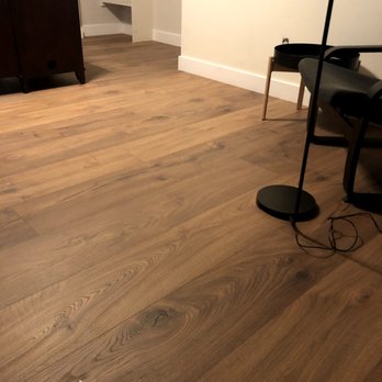 Bare Floors - a room with a piano and a chair - Carpet Installation Near Me - Phoenix, Arizona