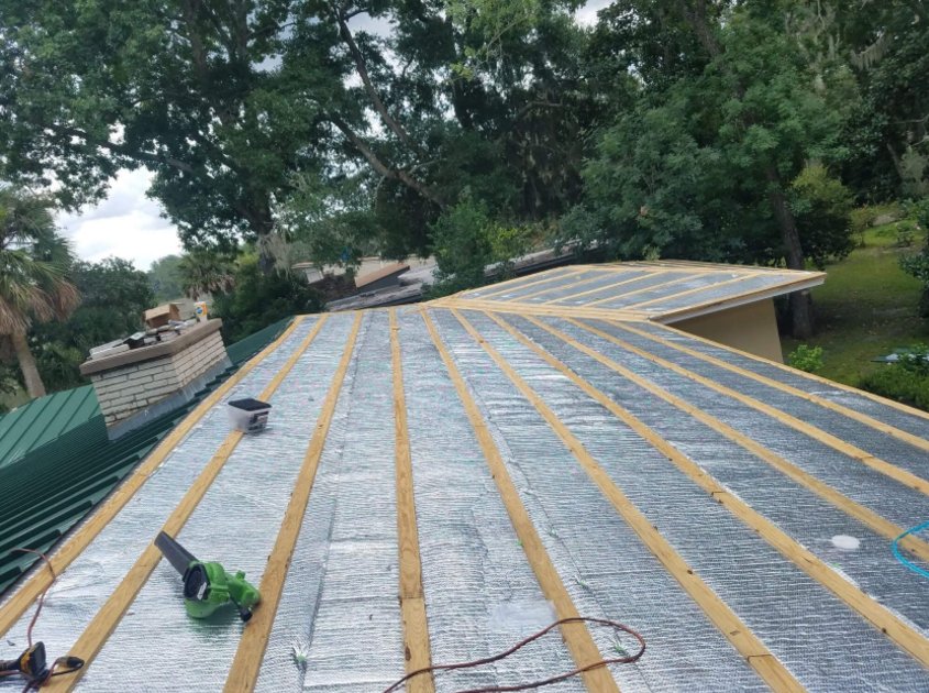 Slide of Lens Reroofing and Repairs