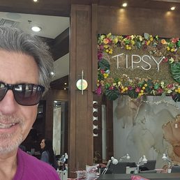 ROSARIO S. CASSATA AT TIPSY SALONBAR IN PALM BEACH GARDENS, FLORIDA.