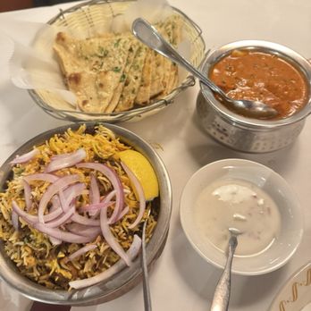 Adda Indian Cuisine - Boneless Chicken Biryani Chicken tikka masala Garlic Naan - Indian Near Me - Chicago, Illinois