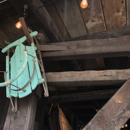 a blue sled hanging from the ceiling