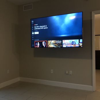 Handytech Installation - 65 inch tv with full motion mount - TV Mounting Near Me - Hallandale Beach, Florida