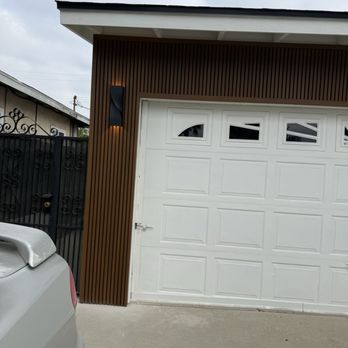 Magic Hand Handyman - Accent material around garage door called new tech wood. - Handyman Near Me - La Puente, California
