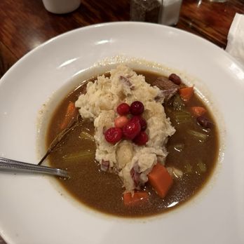 The Pink House - Yummy seasonal roast stew, topped with mashed potatoes and cranberries, at The Pink House. - Sandwiches Near Me - Genoa, Nevada The Pink House - Yummy seasonal roast stew, topped with mashed potatoes and cranberries, at The Pink House. - Sandwiches Near Me - Genoa, Nevada
