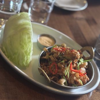 JOEY Burnaby - SZECHUAN CHICKEN LETTUCE WRAPS sweet soy ginger glaze, peanuts, crispy wontons, spicy aloli 24 - Canadian (New) Near Me - Burnaby, British Columbia JOEY Burnaby - SZECHUAN CHICKEN LETTUCE WRAPS sweet soy ginger glaze, peanuts, crispy wontons, spicy aloli 24 - Canadian (New) Near Me - Burnaby, British Columbia