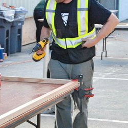 All Around Moving & Installation Services - Laird Blomgren on a Herowork project, refurbishing old tables for the newly renovated community kitchen.
