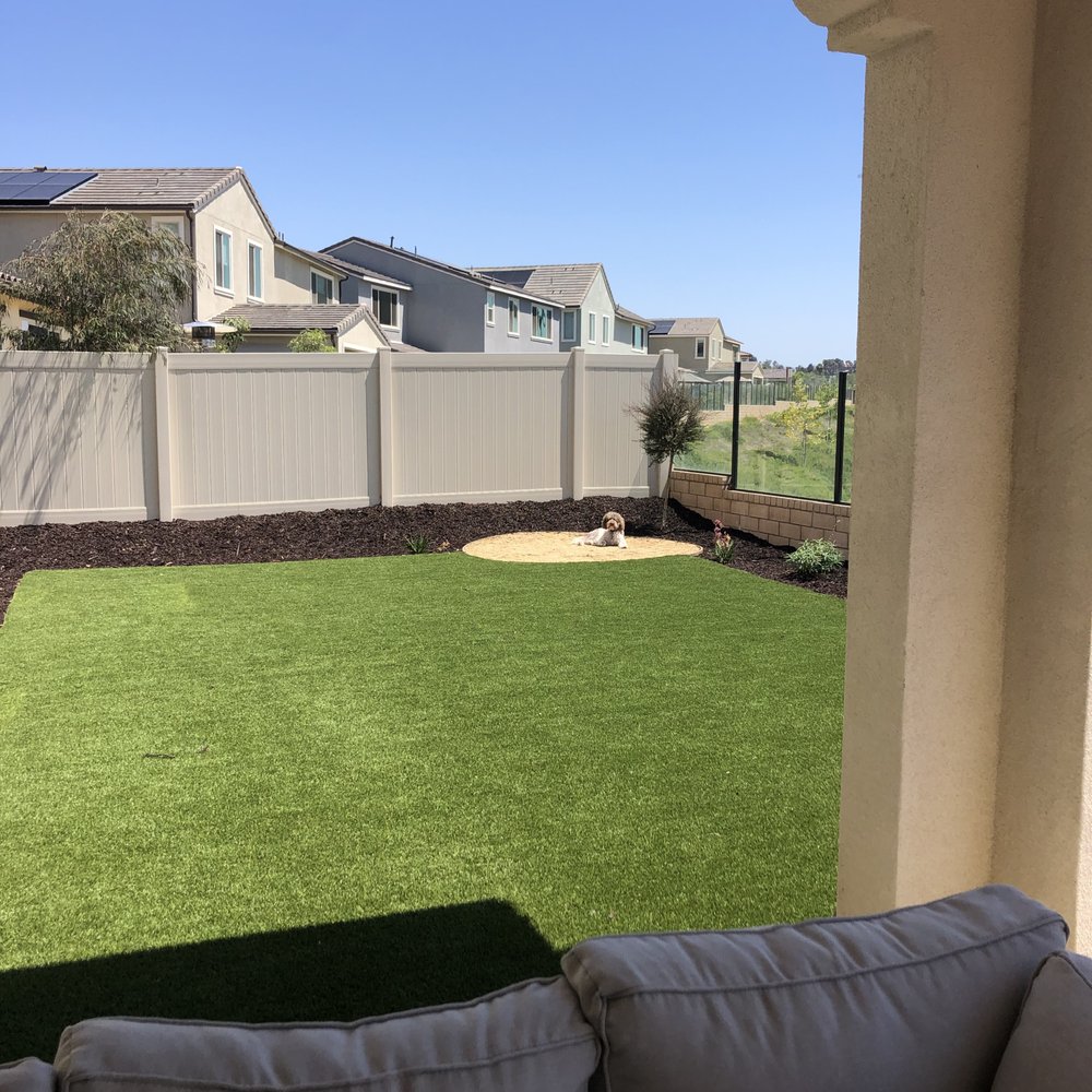 Gran Tierra - a view of a backyard from a patio - Landscaping Near Me - San Marcos, California Gran Tierra - a view of a backyard from a patio - Landscaping Near Me - San Marcos, California