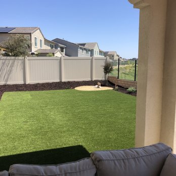 Gran Tierra - a view of a backyard from a patio - Landscaping Near Me - San Marcos, California Gran Tierra - a view of a backyard from a patio - Landscaping Near Me - San Marcos, California