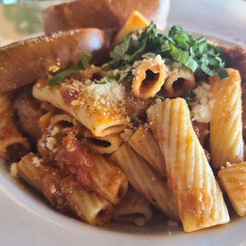 The Boss’s Signature - a plate of pasta and bread - Burgers Near Me - Bartlett, Illinois The Boss’s Signature - a plate of pasta and bread - Burgers Near Me - Bartlett, Illinois