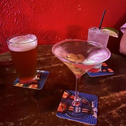 two cocktails on a table two cocktails on a table