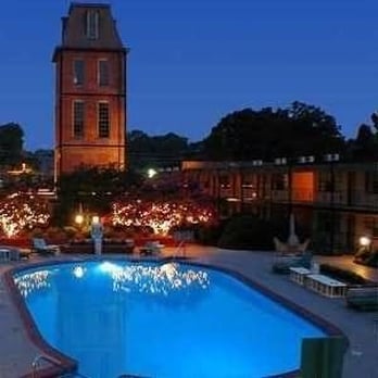 Duke Tower Suites and Condominiums - The pool, courtyard and historic tower - Condominiums Near Me - Durham, North Carolina