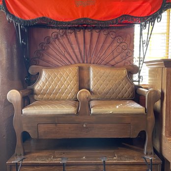 El Rancho Hotel - Antique shoe sign station. Can you imagine who sat in these seats? - Hotels Near Me - Gallup, New Mexico El Rancho Hotel - Antique shoe sign station. Can you imagine who sat in these seats? - Hotels Near Me - Gallup, New Mexico