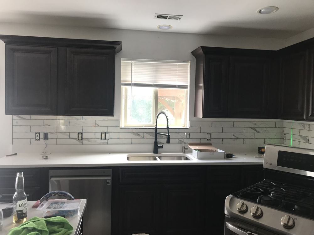 Slide of 2 Cousins Construction