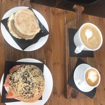 Ground Hideout Coffee - Sausage sandwich, goat cheese and salmon bagel, latte, and macchiato - Coffee & Tea Near Me - Long Beach, California Ground Hideout Coffee - Sausage sandwich, goat cheese and salmon bagel, latte, and macchiato - Coffee & Tea Near Me - Long Beach, California