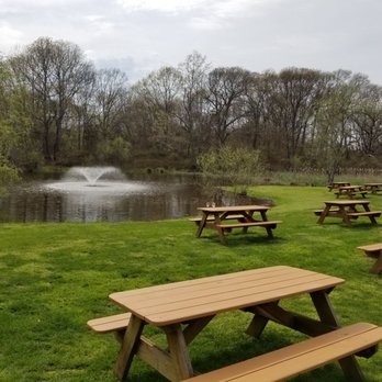Pugliese Vineyards - Outside seating area. - Wineries Near Me - Cutchogue, New York Pugliese Vineyards - Outside seating area. - Wineries Near Me - Cutchogue, New York
