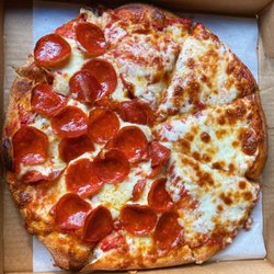Charley’s Place - Large 8-cut half cheese half pepperoni pizza from Charley's Place. Delicious!