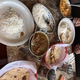 Goat curry with roti, mango chicken with sweet naan Goat curry with roti, mango chicken with sweet naan