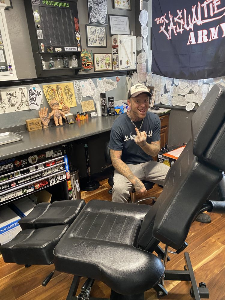 Closed Casket Tattoo Parlor Photos