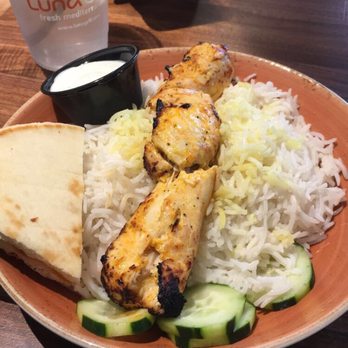 Luna Grill University Center - Kids meal(very filling) of chicken, rice, pita bread, cucumbers, and side sauce. $4.75 - Mediterranean Near Me - Irvine, California