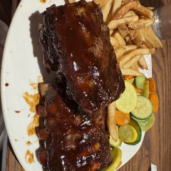 Outback Steakhouse - Overcooked ribs with cold fries. Messy presentation... - Steakhouses Near Me - Davie, Florida Outback Steakhouse - Overcooked ribs with cold fries. Messy presentation... - Steakhouses Near Me - Davie, Florida