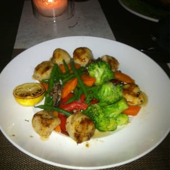 Seasons 52 - Caramelized Sea Scallops with Vegetable Medley - New American Near Me - Orlando, Florida