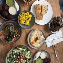 French Fries, Hummus, Pickled Cauliflower, Falafel and Sauces, Brussels Sprouts, kale salad French Fries, Hummus, Pickled Cauliflower, Falafel and Sauces, Brussels Sprouts, kale salad