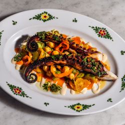 Osteria Morini - Interior dining room at Morini with an antipasti dish called polpo