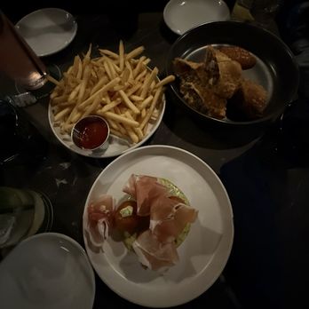Milly's Neighborhood Bar - Chop cheese egg rolls , french fries , corn fritters - New American Near Me - Brooklyn, New York Milly's Neighborhood Bar - Chop cheese egg rolls , french fries , corn fritters - New American Near Me - Brooklyn, New York