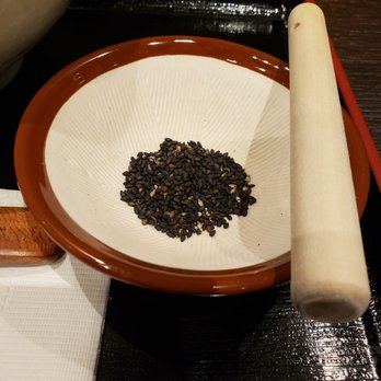 Ramen Isshin - small bowl of black sesame that you can grind into powder to get added flavour - Ramen Near Me - Toronto, Ontario Ramen Isshin - small bowl of black sesame that you can grind into powder to get added flavour - Ramen Near Me - Toronto, Ontario