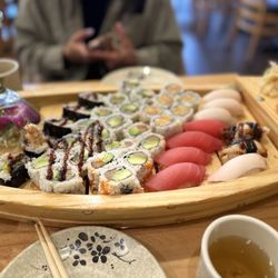 Sushi Tokoro - All you can eat sushi! Michigan Roll, tuna nigiri, salmon nigiri, white tuna nigiri, eel roll, Spicy Salmon Roll, Shrimp Tempura Roll