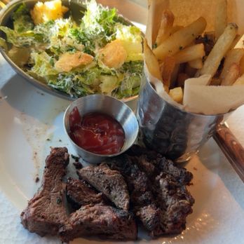 Haywire - Cowgirl Dinner (Only for the month of March) Steak, Cesar salad, with a side of tallow fries. Drink choice martini or lemon drop martini - New American Near Me - Austin, Texas