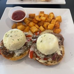 Christine's Cafe & Gourmet Coffee - Philly cheesesteak eggs Benedict