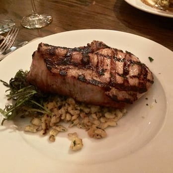 Aliment - PORK CHOP
"SPAETZLE, MUSTARD GREENS AND APPLE GINGER GLAZE       28" - New American Near Me - San Francisco, California