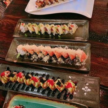 Komorebi Sushi - Top to bottom: Spicy Tataki Roll, Meguan Roll, R and J Roll, Dragon Roll, Baked Sake Roulade Plate - Sushi Bars Near Me - Chicago, Illinois Komorebi Sushi - Top to bottom: Spicy Tataki Roll, Meguan Roll, R and J Roll, Dragon Roll, Baked Sake Roulade Plate - Sushi Bars Near Me - Chicago, Illinois