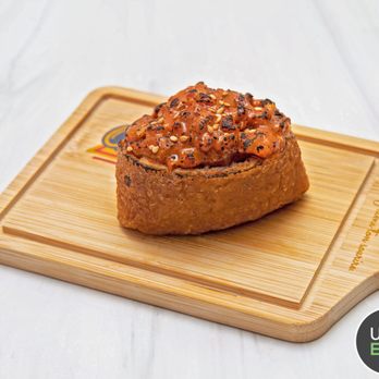 Oops Tea - a piece of bread on a cutting board - Bubble Tea Near Me - New York, New York
