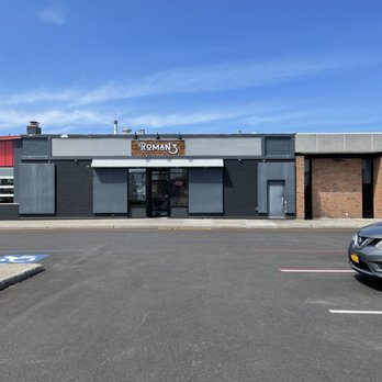 Roman's - Exterior from rear parking lot - Pizza Near Me - Batavia, New York