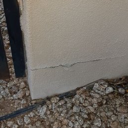a crack in the corner of a building a crack in the corner of a building