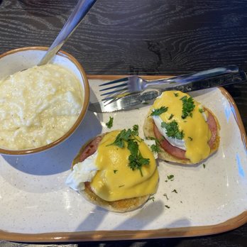 Brunches - Eggs Benedict with side order of grits - Breakfast & Brunch Near Me - Cary, North Carolina Brunches - Eggs Benedict with side order of grits - Breakfast & Brunch Near Me - Cary, North Carolina