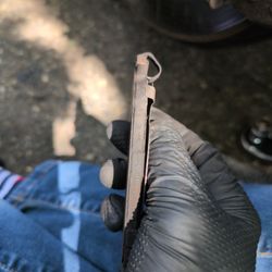 Octane Automotive - Brake pad worn down to metal.