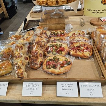 Concerto Bakery - Sausage bread varieties. 3/25/2026 - Bakeries Near Me - Los Angeles, California