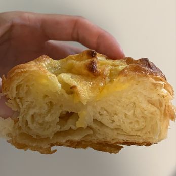 La Tour Cafe - Inside of the Dan Tat Kouign Amann ($4.90) - looks and tastes just like the original kouign amann - hardly any custard - Cafes Near Me - Honolulu, Hawaii La Tour Cafe - Inside of the Dan Tat Kouign Amann ($4.90) - looks and tastes just like the original kouign amann - hardly any custard - Cafes Near Me - Honolulu, Hawaii