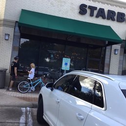 Exterior outside entrance of Starbucks - Sign - Austin, Texas Exterior outside entrance of Starbucks - Sign - Austin, Texas