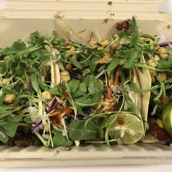 TaKoz Mod Mex - Three tacos with plenty of fresh arugula on top - Street Vendors Near Me - San Jose, California