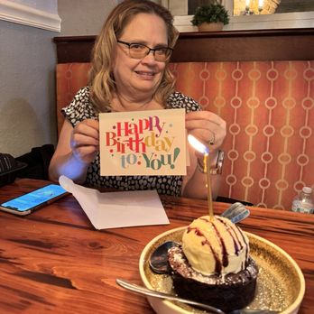 Garp & Fuss - Bday girl with her complimentary bday cake (dessert) and bday card signed by the staff & crew. How sweet is that! - American Near Me - Winter Park, Florida
