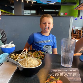HuHot Mongolian Grill - A happy, full kid - Mongolian Near Me - Flagstaff, Arizona HuHot Mongolian Grill - A happy, full kid - Mongolian Near Me - Flagstaff, Arizona
