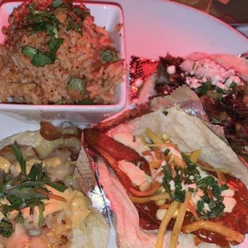 The Fold: Botanas & Bar - The 3 choice tacos. One shrimp taco, one fish taco and one pork taco with red rice. - Bars Near Me - Little Rock, Arkansas The Fold: Botanas & Bar - The 3 choice tacos. One shrimp taco, one fish taco and one pork taco with red rice. - Bars Near Me - Little Rock, Arkansas